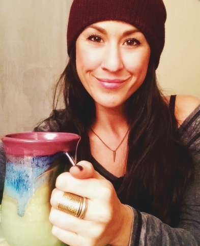 boulder acupuncturist caitlin gordon drinking coffee