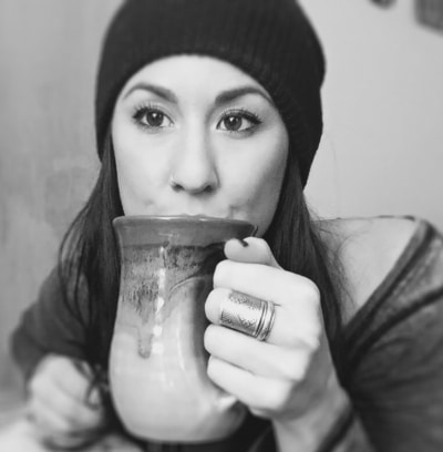 boulder acupuncturist caitlin gordon drinking coffee