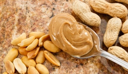 spoon with peanut butter 