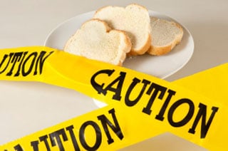 bread on plate covered in caution tape
