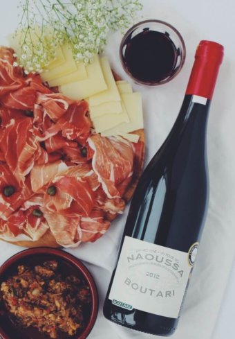 A Bottle of Wine and Charcuterie Board