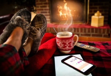 fuzzy slippers, fireplace, and hot tea