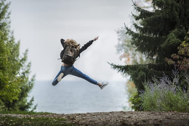 woman jumping for joy